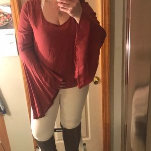 NWOT A long sleeved bell sleeves with back v shape
